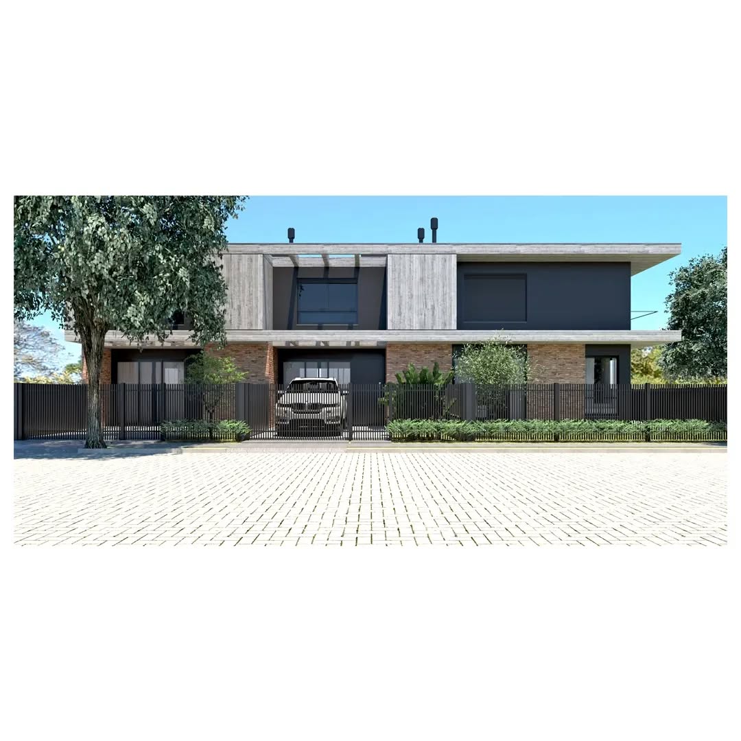 Vista frontal de residência contemporânea com jardim